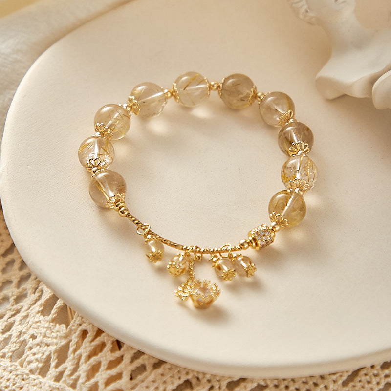 Golden Wind Chime Golden Rutilated Quartz Bracelet with Snowflake Charm | Luck & Elegance Jewelry