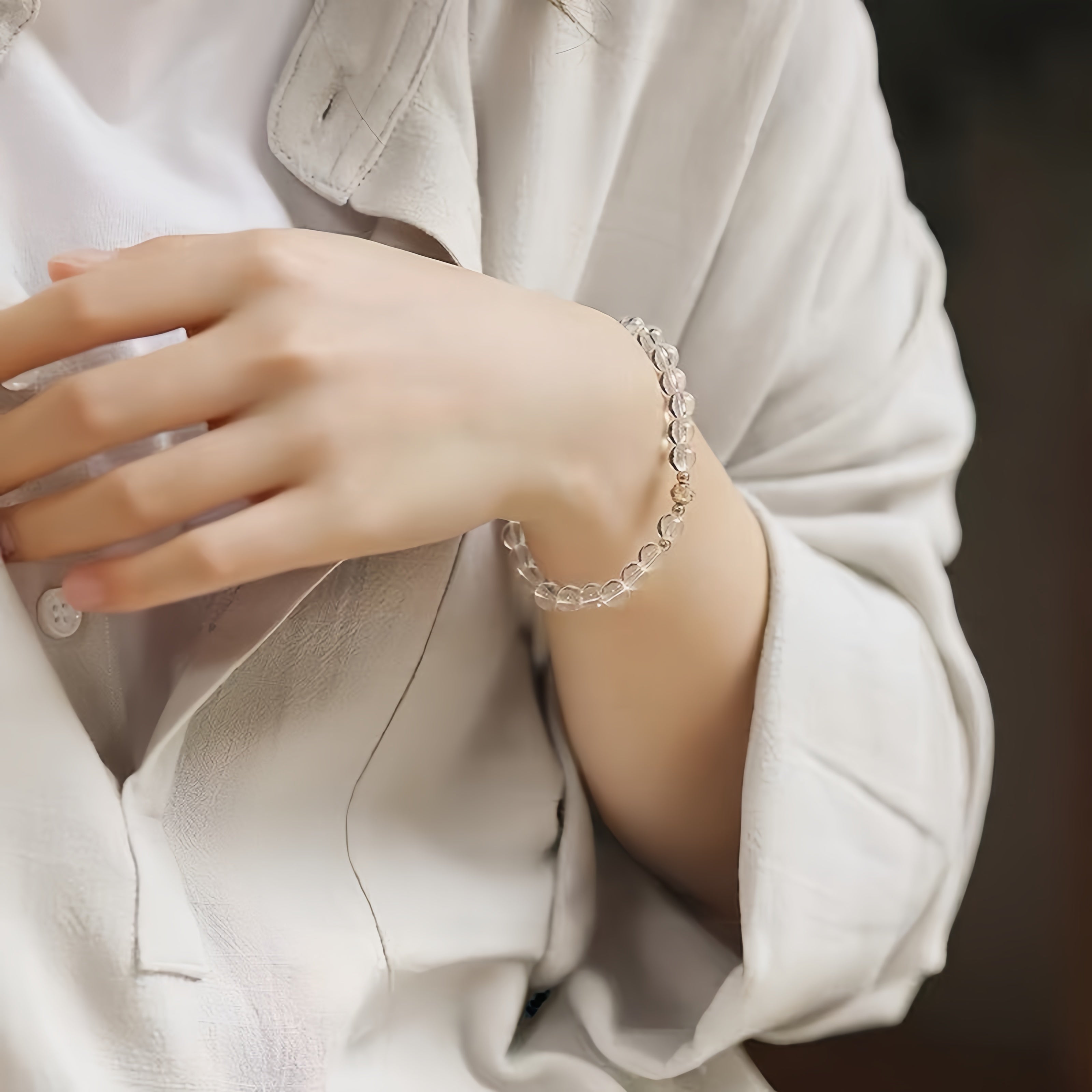 Close-up of natural Clear Quartz crystal beads showcasing transparent gemstone beauty and polished finish
