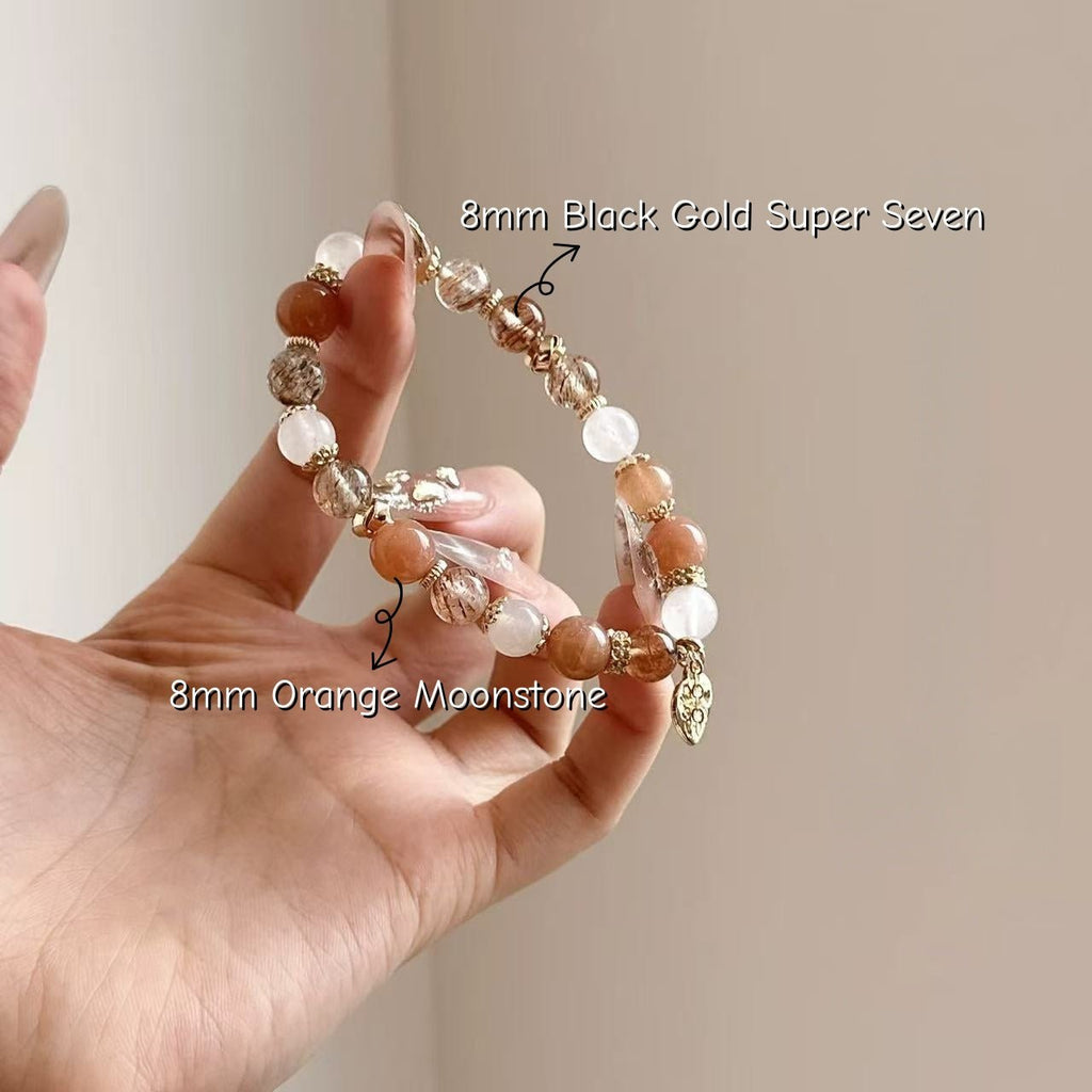 Eclipse Gold Crystal Bracelet Orange & Blue Moonstone with Black Gold Super Seven - Joyceen Crystal