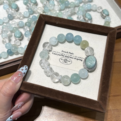 Joyceen Dreamy Summer Crystal Bracelet featuring Aquamarine, Azeztulite, and Amazonite gemstones in refreshing ocean-blue tones