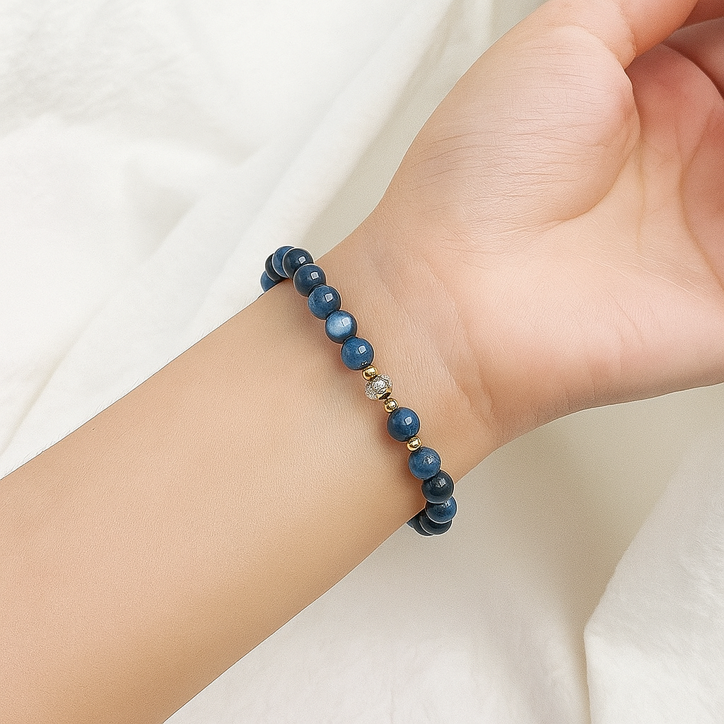 Close-up of natural blue Kyanite gemstone beads showcasing unique crystal texture and rich color