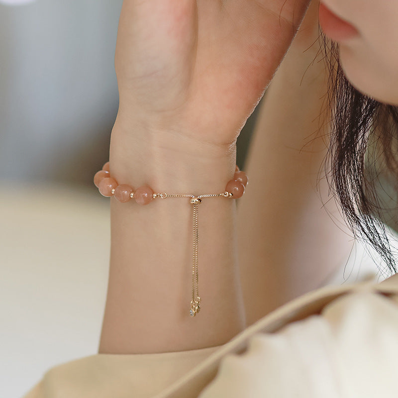 Orange Moonstone crystal bracelet for women, a meaningful gift symbolizing positivity and new beginnings.