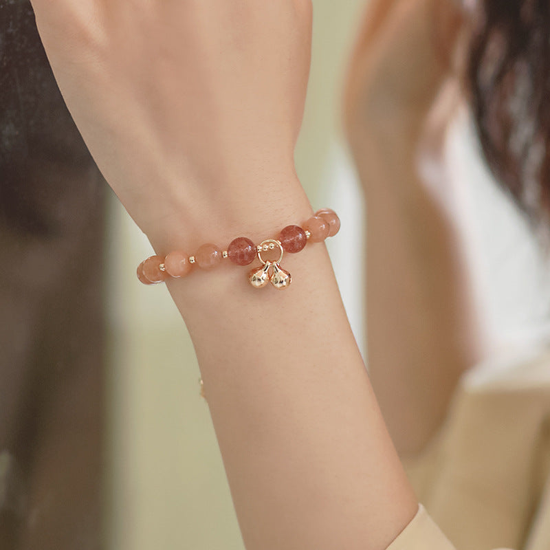 Close-up of natural Orange Moonstone beads featuring warm glow and elegant handcrafted details.